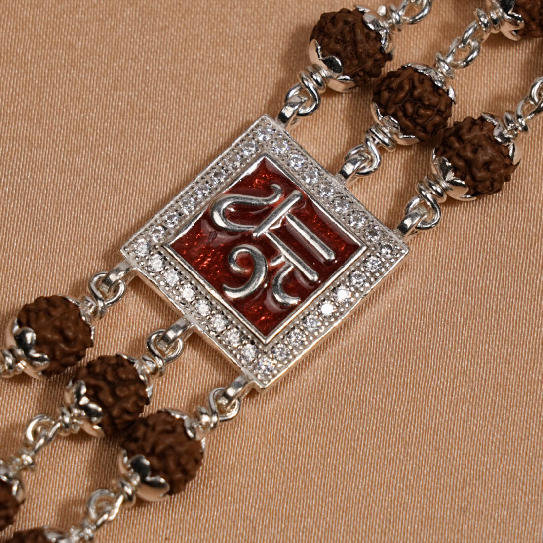 Rudraksha Silver Shree in Red Triple Line Bracelet