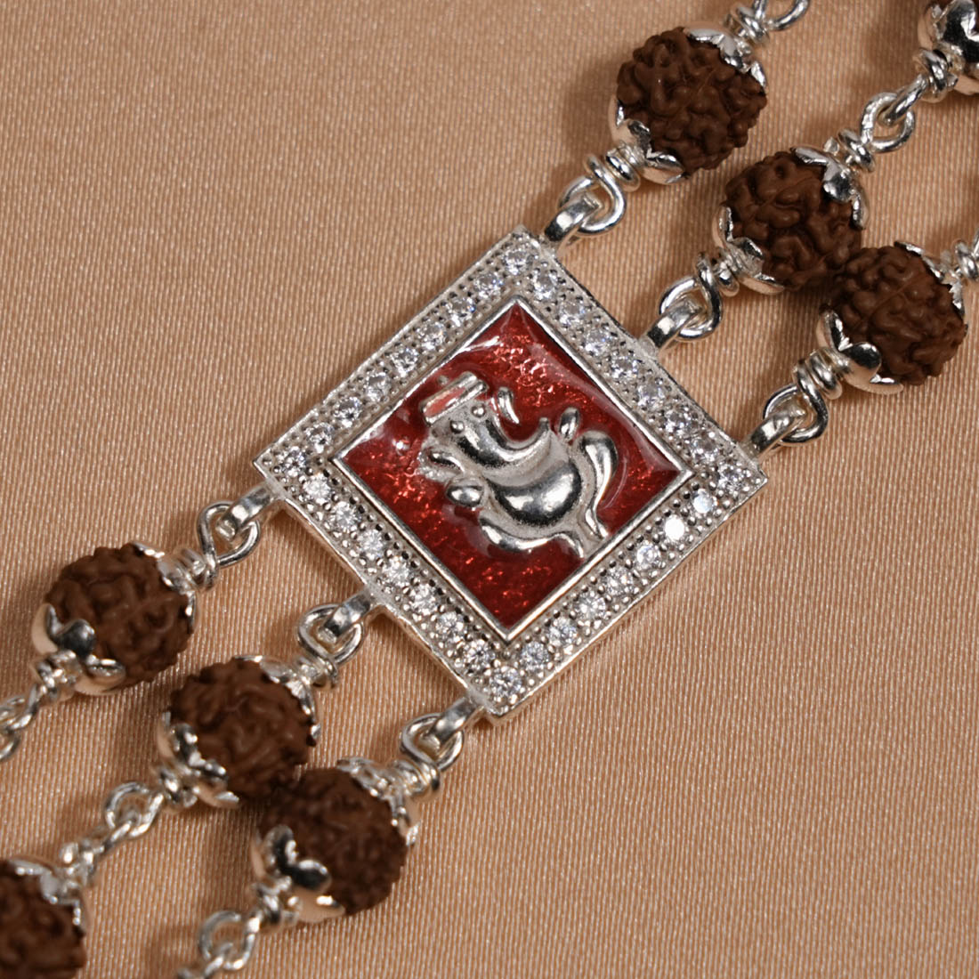 Rudraksha Silver Ganesh in Red Triple Line Bracelet
