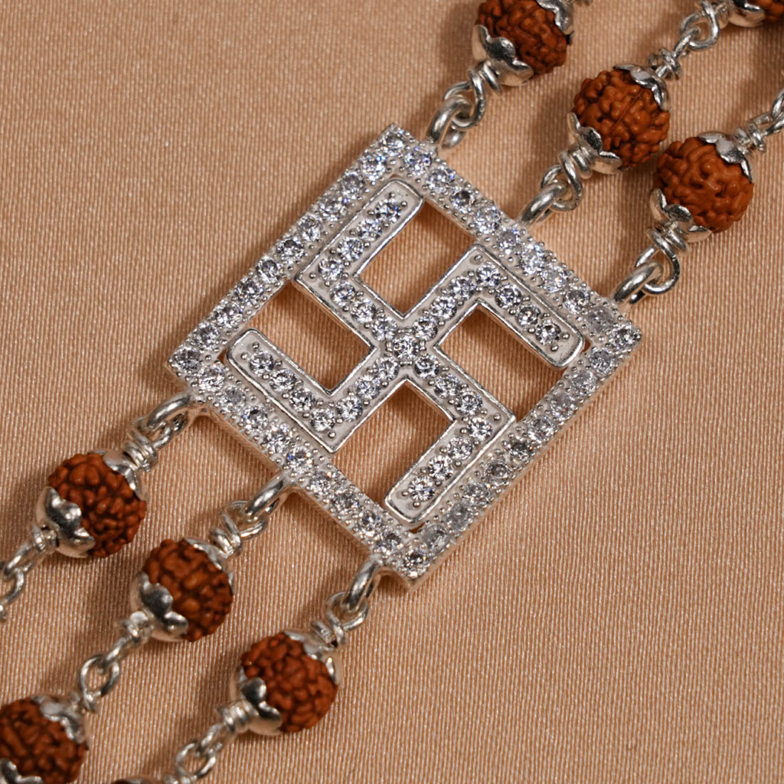 Rudraksha Silver Swastik Brooch Triple Line Bracelet