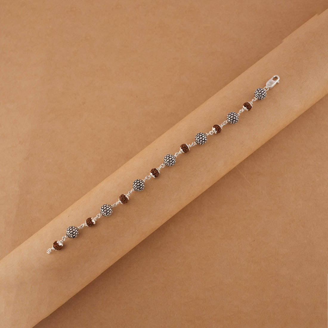 Authentic Rudraksha Silver Hollow Round Beads Bracelet.
