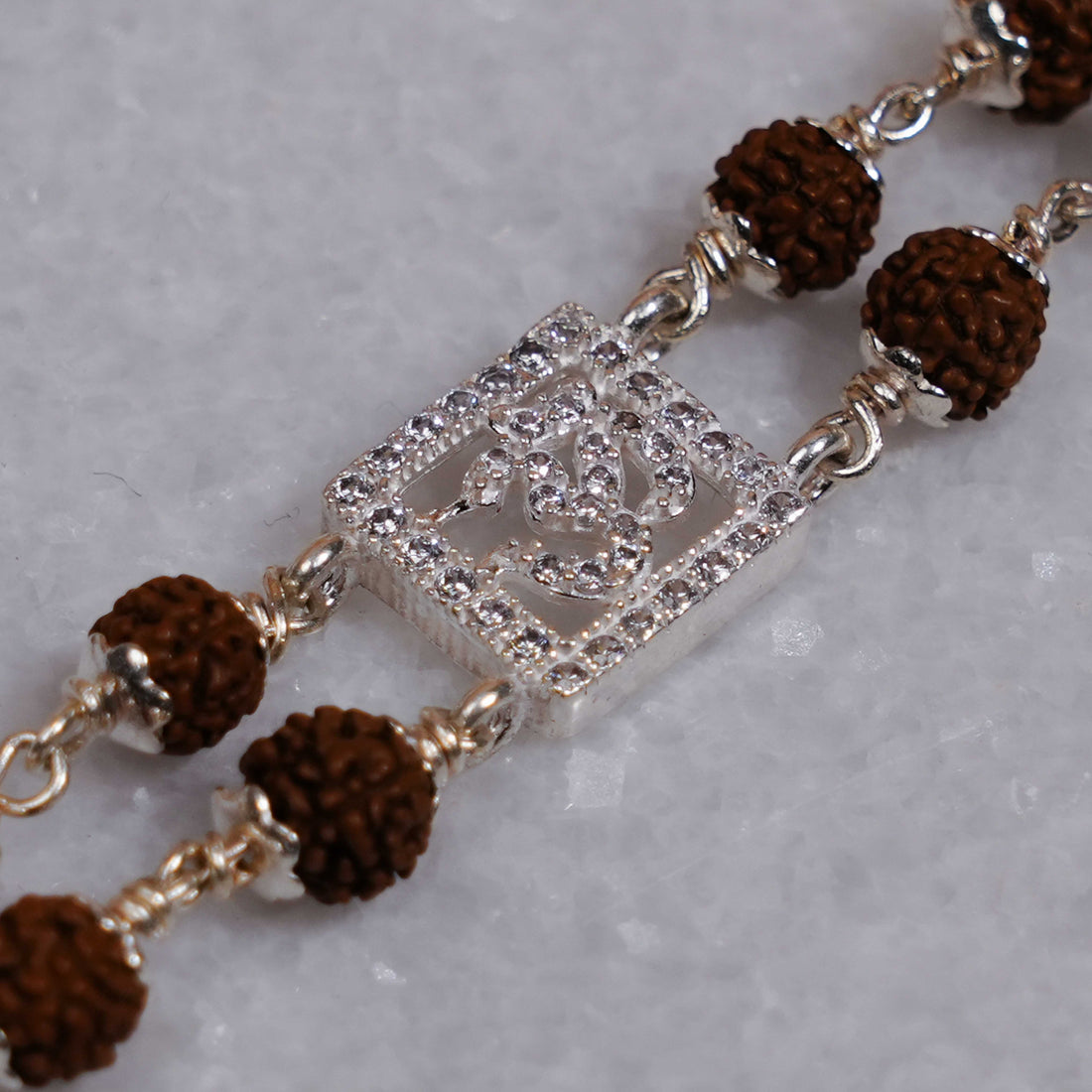 Rudraksha Silver Om With Ganesh Double Line Bracelet