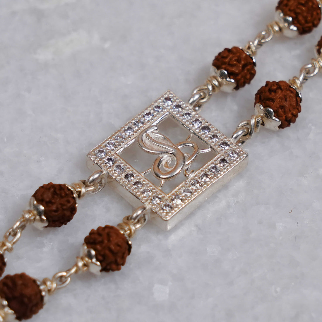 Rudraksha Silver Bracelet with Central Naag Double Line