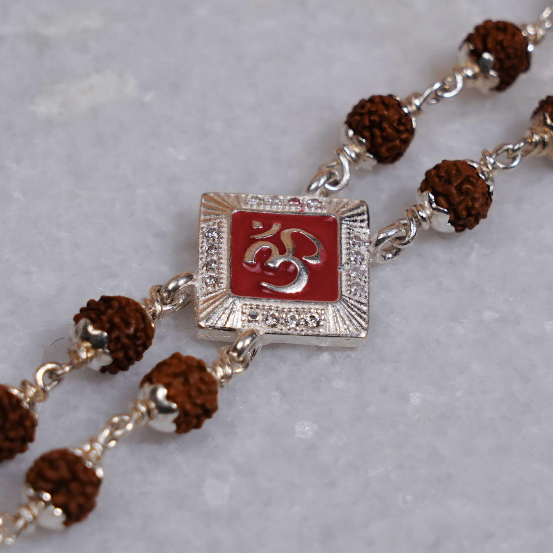 Rudraksha Silver Om Red-Col Double Line Bracelet
