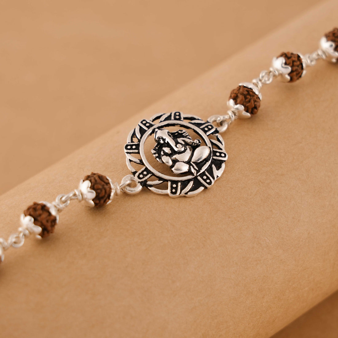 Rudraksha Silver Bracelet With Ganesh in a Circular Sphere