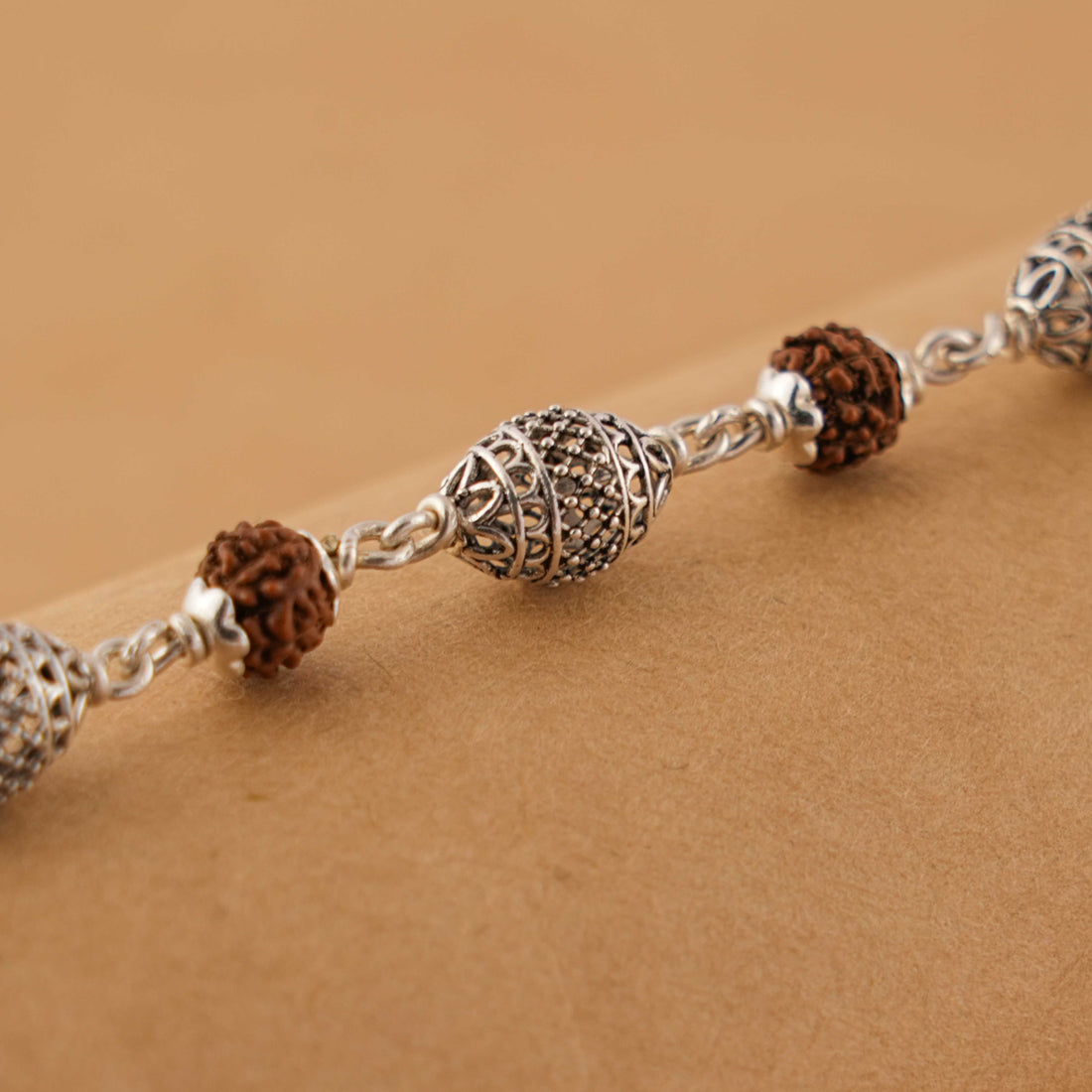 Rudraksha and Cylindrical Silver Beads Bracelet