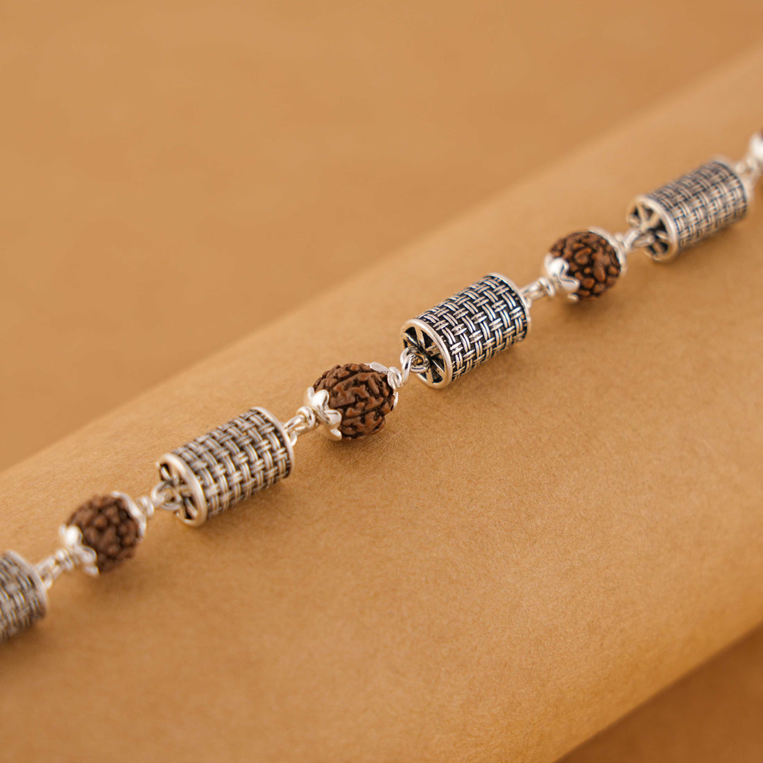 Rudraksha and Hollow Cylindrical Silver Beads Bracelet