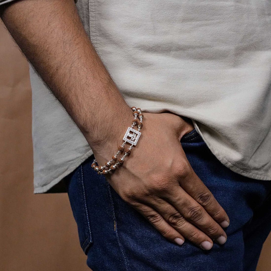 Rudraksha Silver bracelet with single Naag double line for men