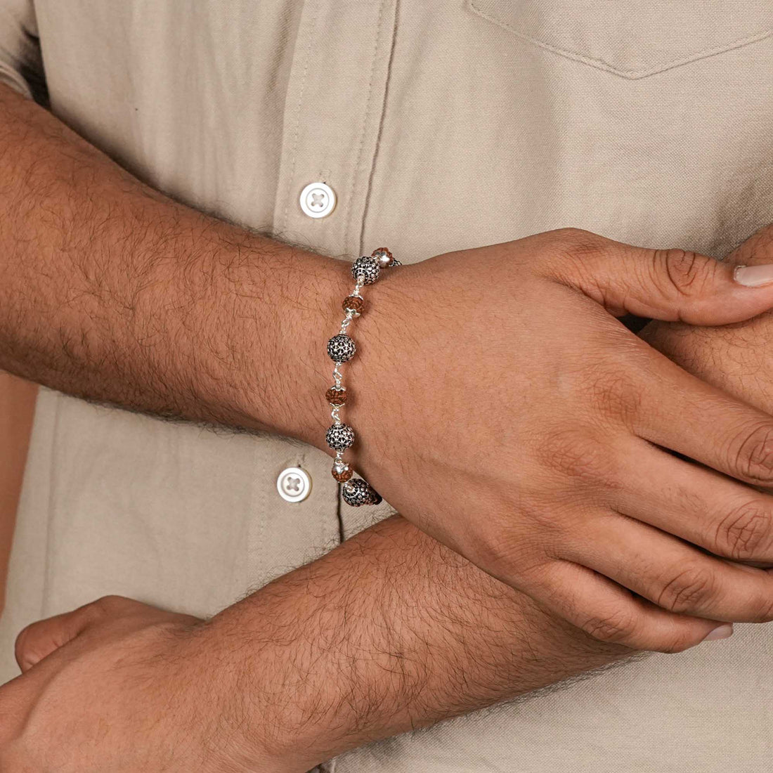 Buy Rudraksha Silver Hollow Round Beads Bracelet.