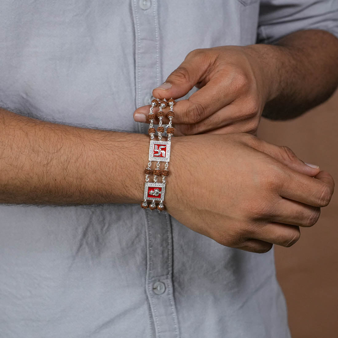 Rudraksha Silver Ganesh With Swastik Tripal Line Bracelet