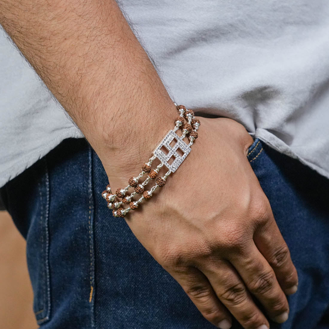 Rudraksha Silver Swastik Triple Line Bracelet
