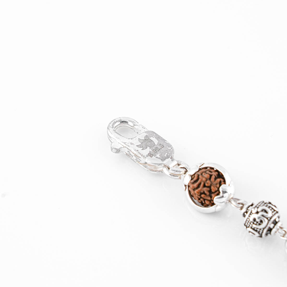 Silver Rakhi with Om Beads Capping and Rudraksha Bracelet