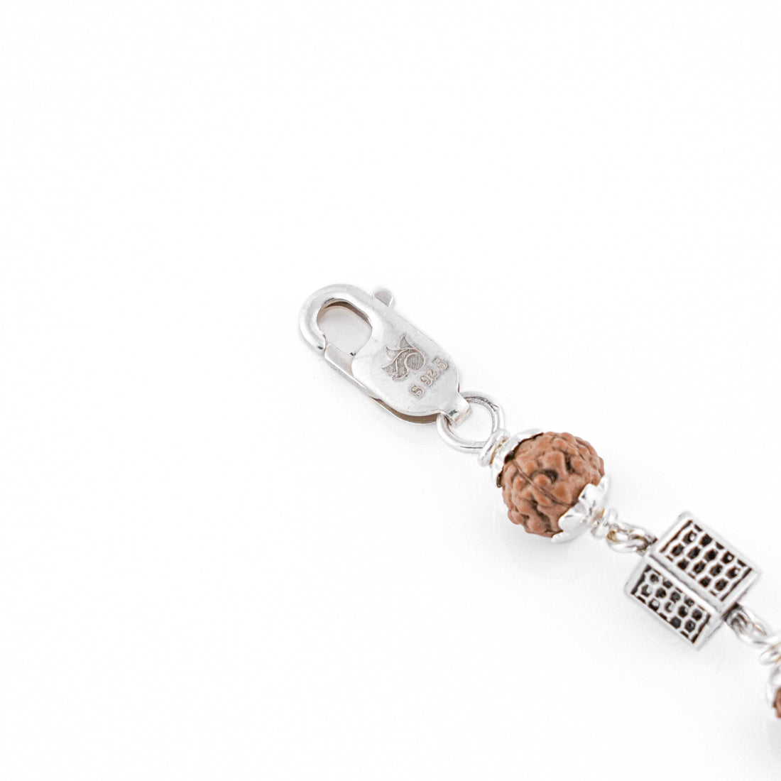 Silver Rakhi with Square Cylinder Rudraksha Beads