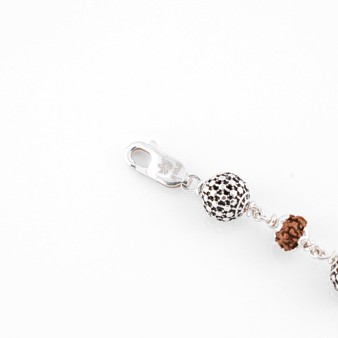 Rudraksha Silver Hollow Round Beads Bracelet.
