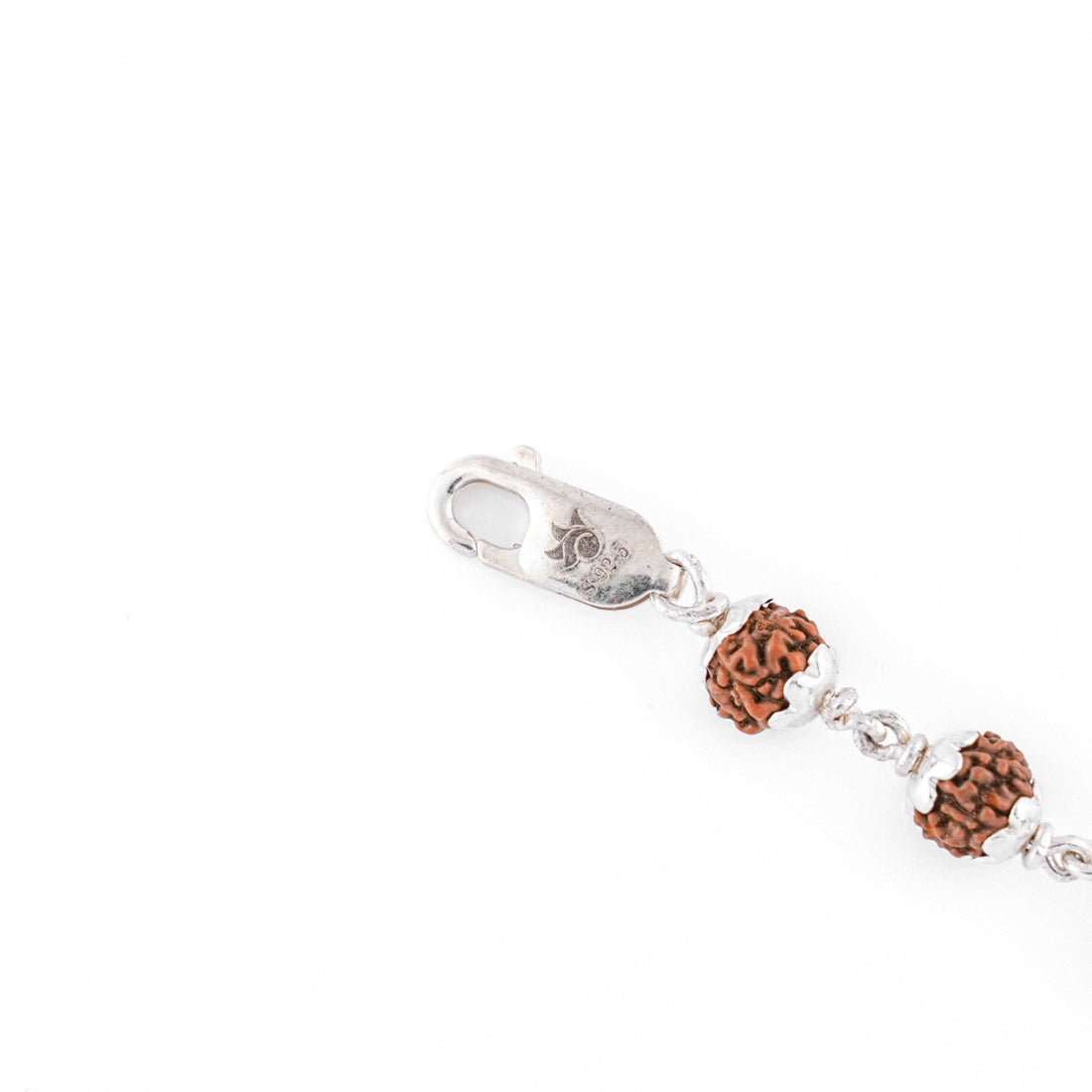 Silver Rakhi with Ganesh in a Designer Circular Sphere and Single Line Rudraksha
