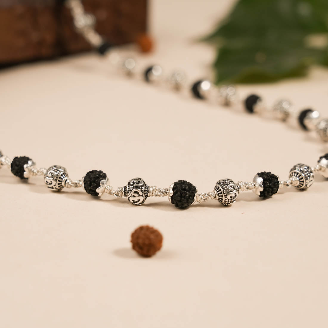 Black Rudraksha with Om Silver Beads Mala