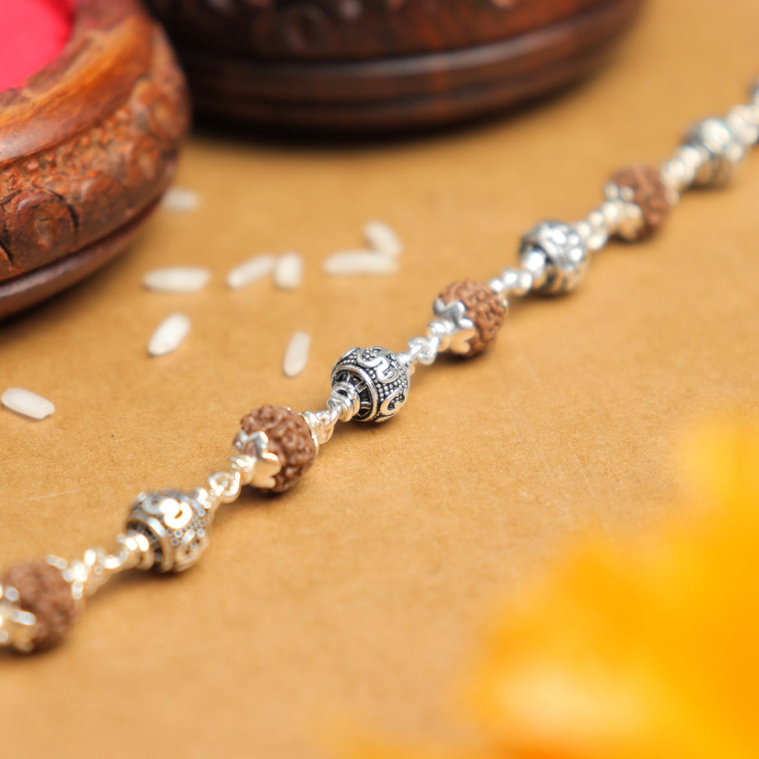 Pure Silver Rakhi with Rudraksha and Om Beads