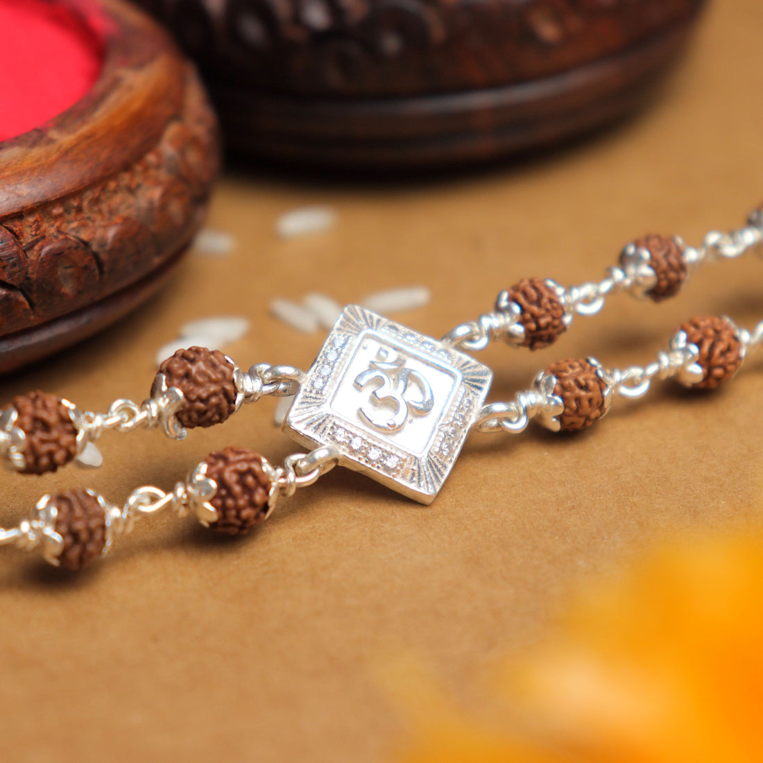 Pure Silver Rakhi with Rudraksha, Om, and Rhombus Double Line Design