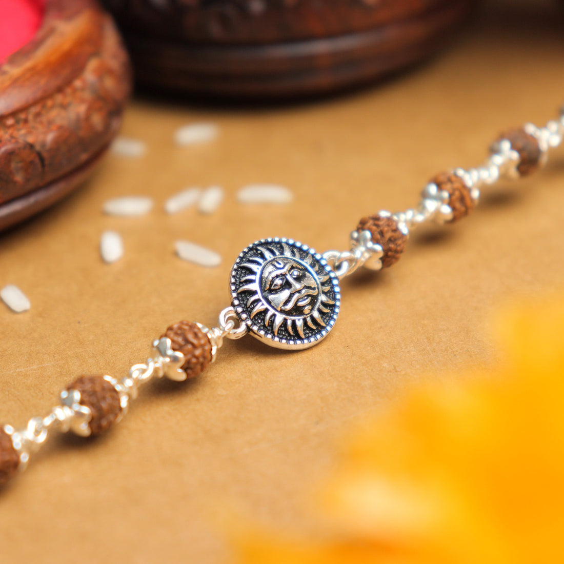 Pure Silver Rakhi with Suryadev and Rudraksha