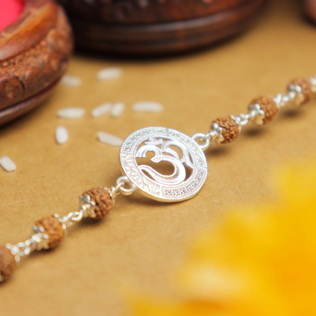 Silver Rakhi with Om and Single Line Rudraksha
