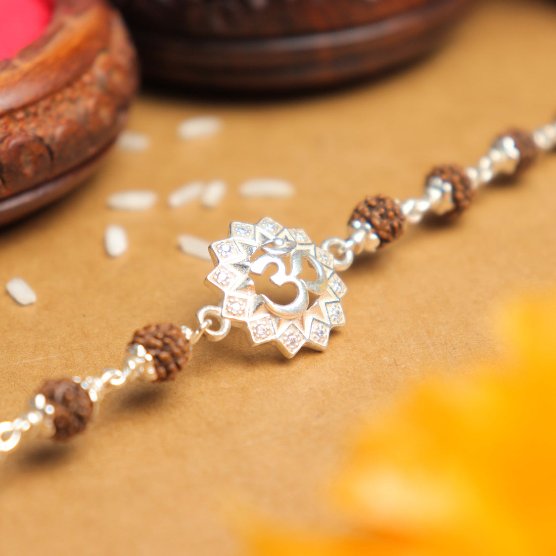 Pure Silver Rakhi with Om in a Concave Sphere and Single Line Rudraksha