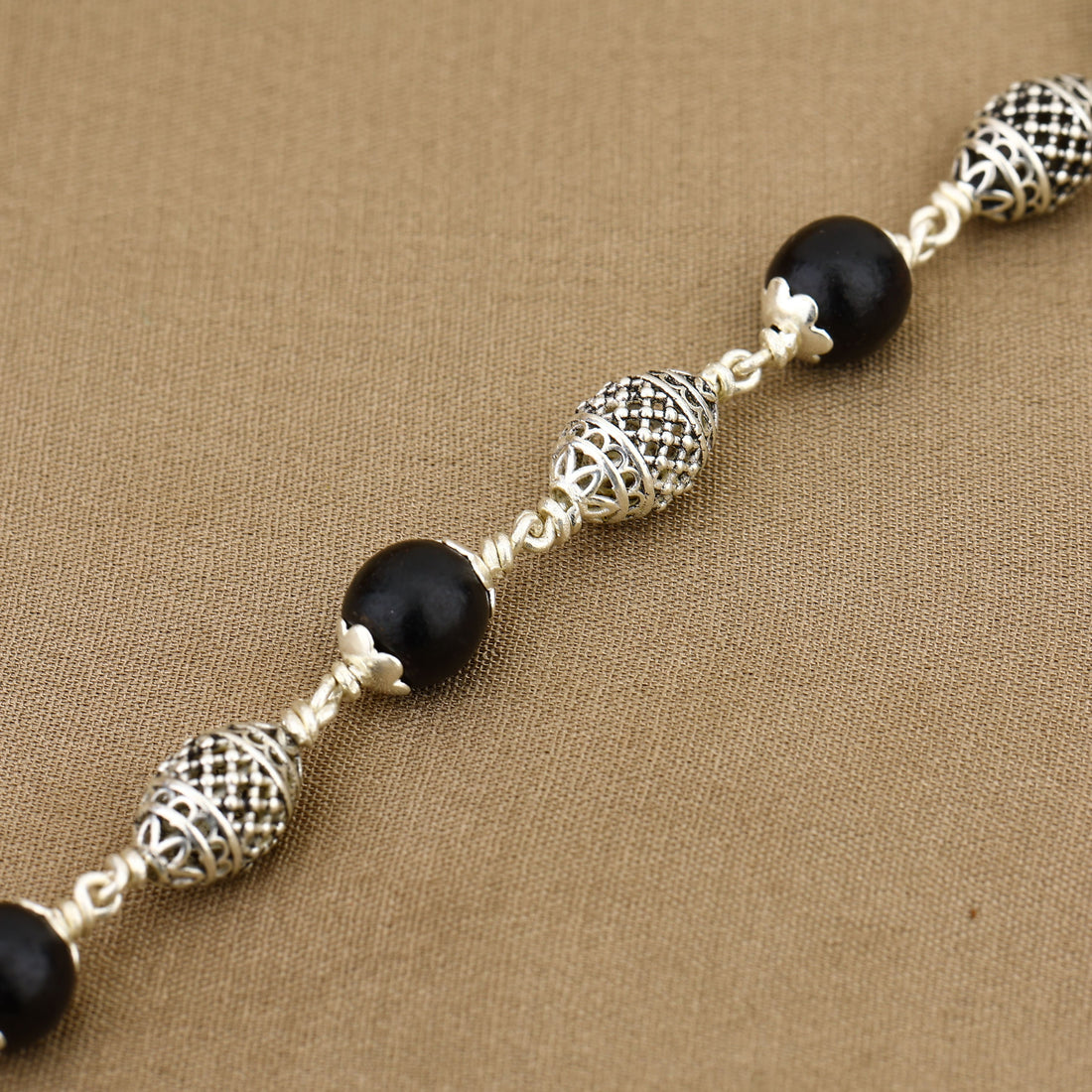 Karungali with Cylindrical Silver Bracelet
