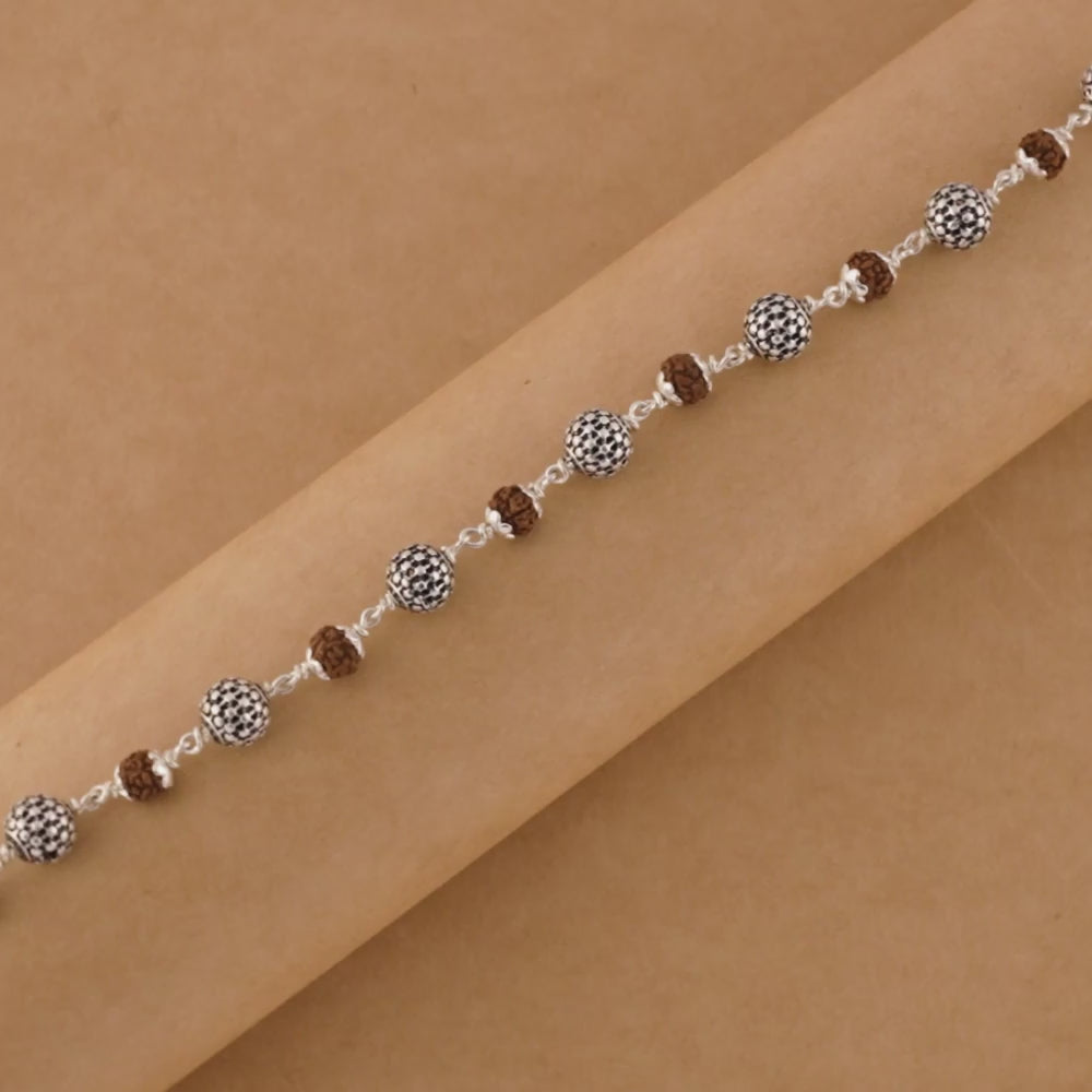 Rudraksha Silver Hollow Round Beads Bracelet.