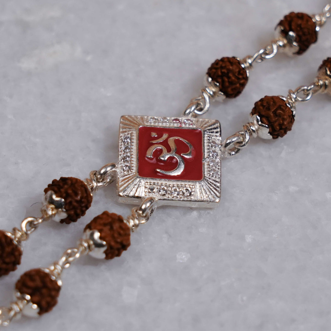 Rudraksha Silver Om Red-Col Double Line Bracelet