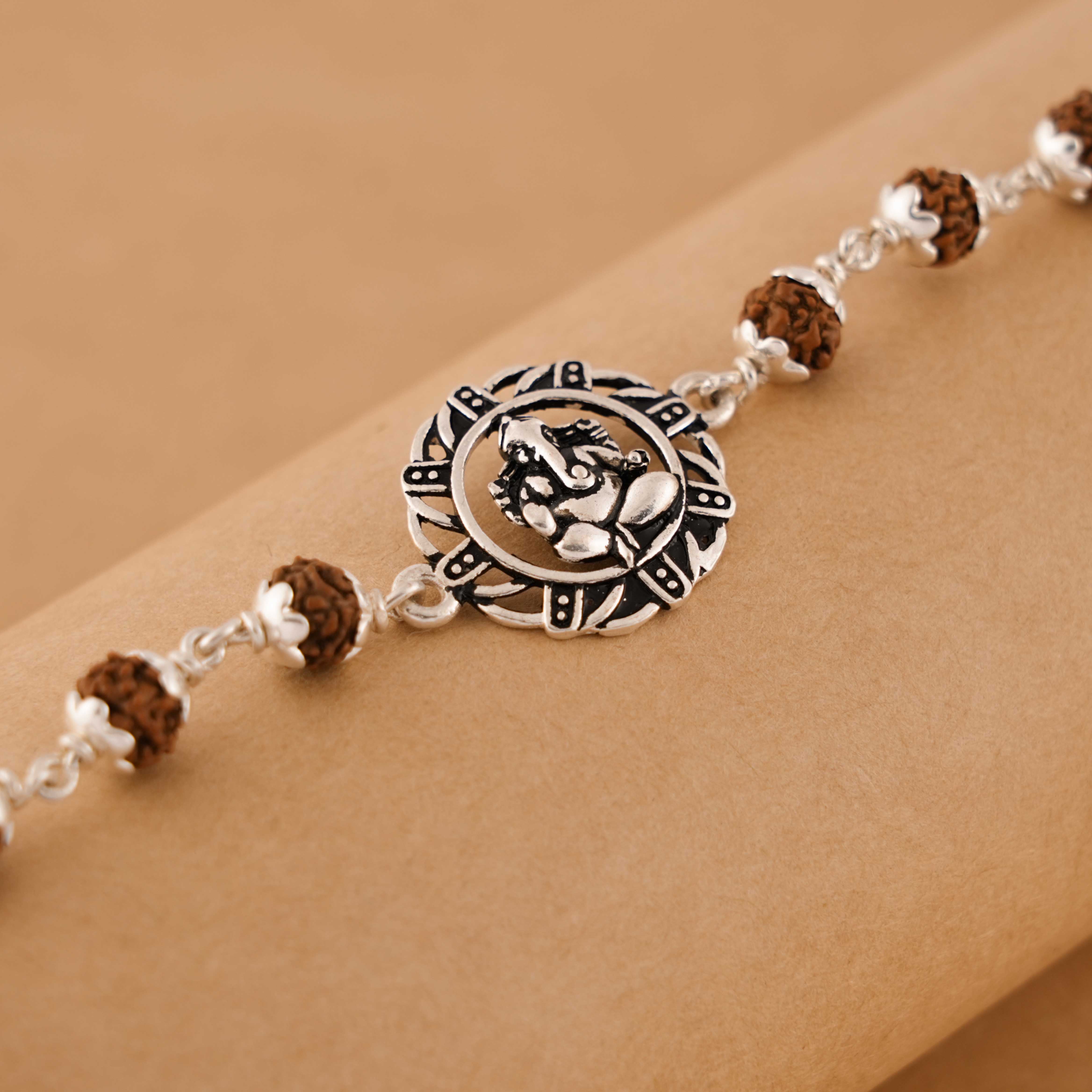 Rudraksha Silver Bracelet With Ganesh in a Circular Sphere