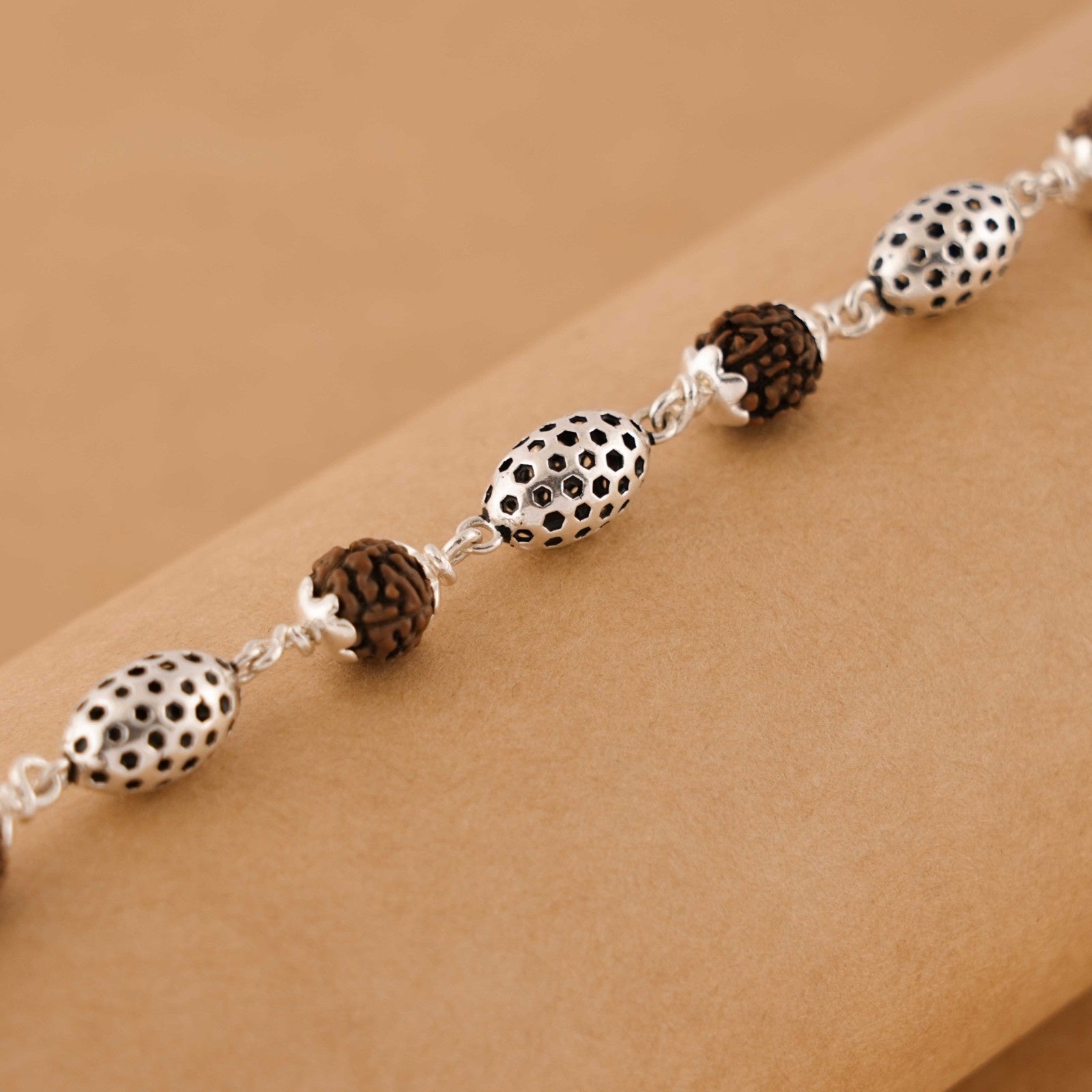 Rudraksha Silver Hollow Oval Beads Bracelet.