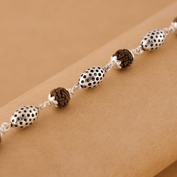 Rudraksha Silver Hollow Oval Beads Bracelet.