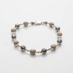 Tulsi with Silver Textured Round Beads Bracelet
