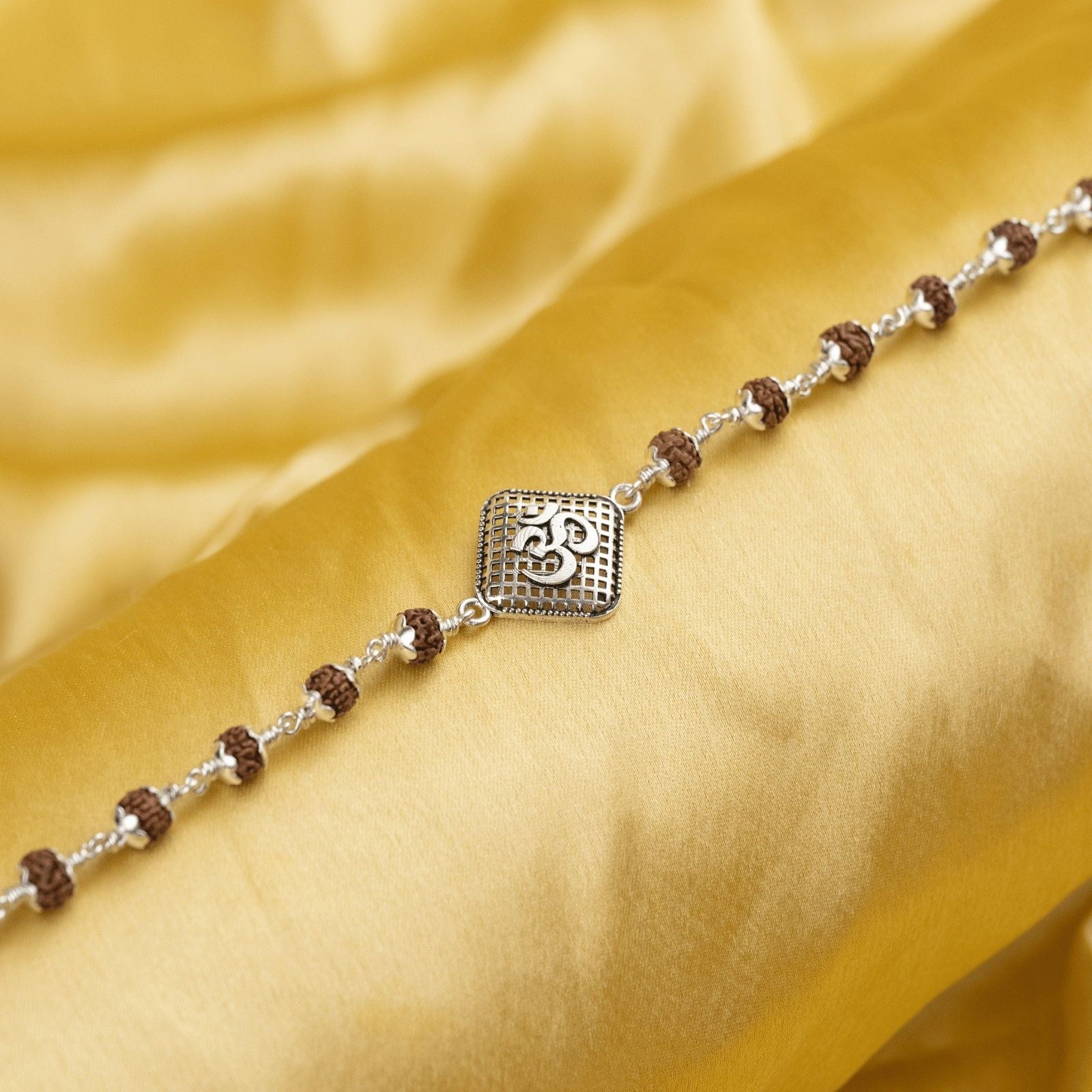 Rudraksha With Om on Rhombus Silver Broach Bracelet