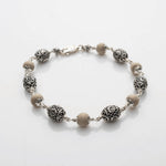 Tulsi With Silver Oval Om Beads Bracelet