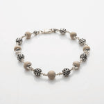 Tulsi with Round Om Beads Silver Bracelet