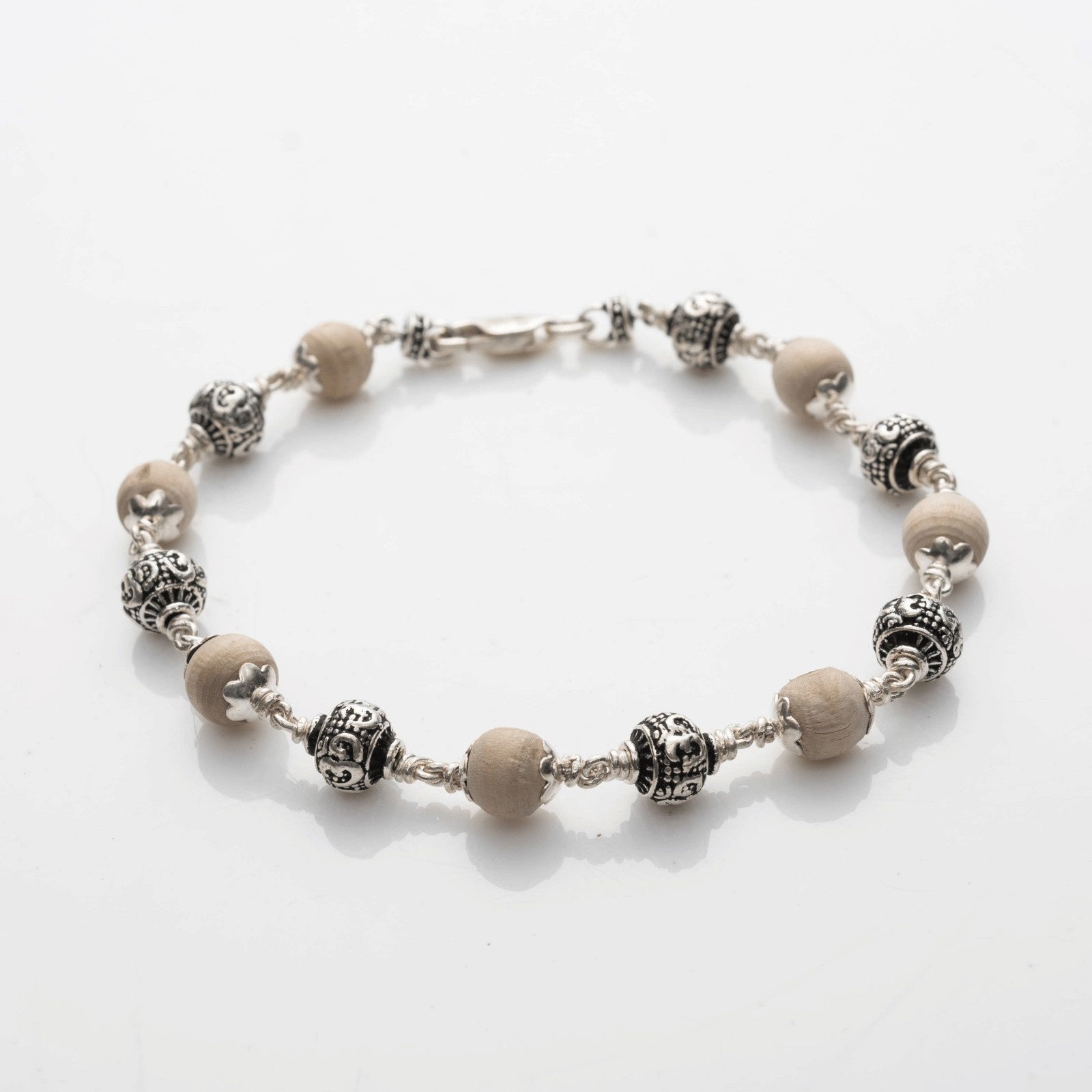 Tulsi Silver Om Beads Bracelet