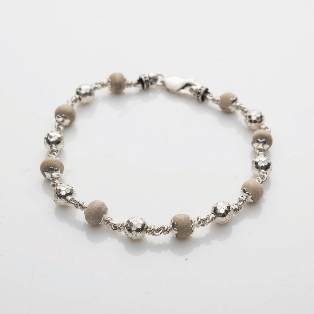 Tulsi With CNC Silver Beads Bracelet