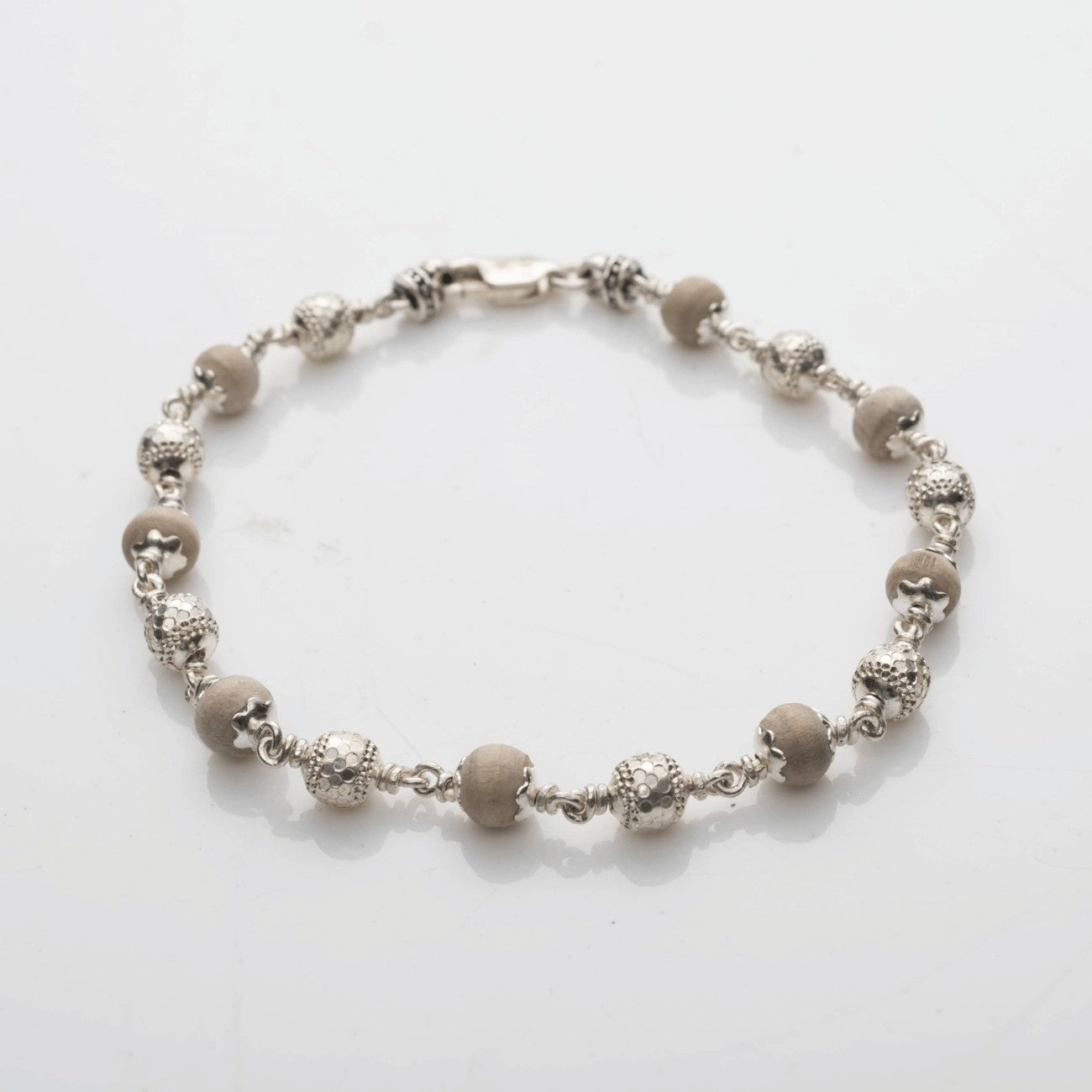 Natural Tulsi With CNC Beads Silver Bracelet