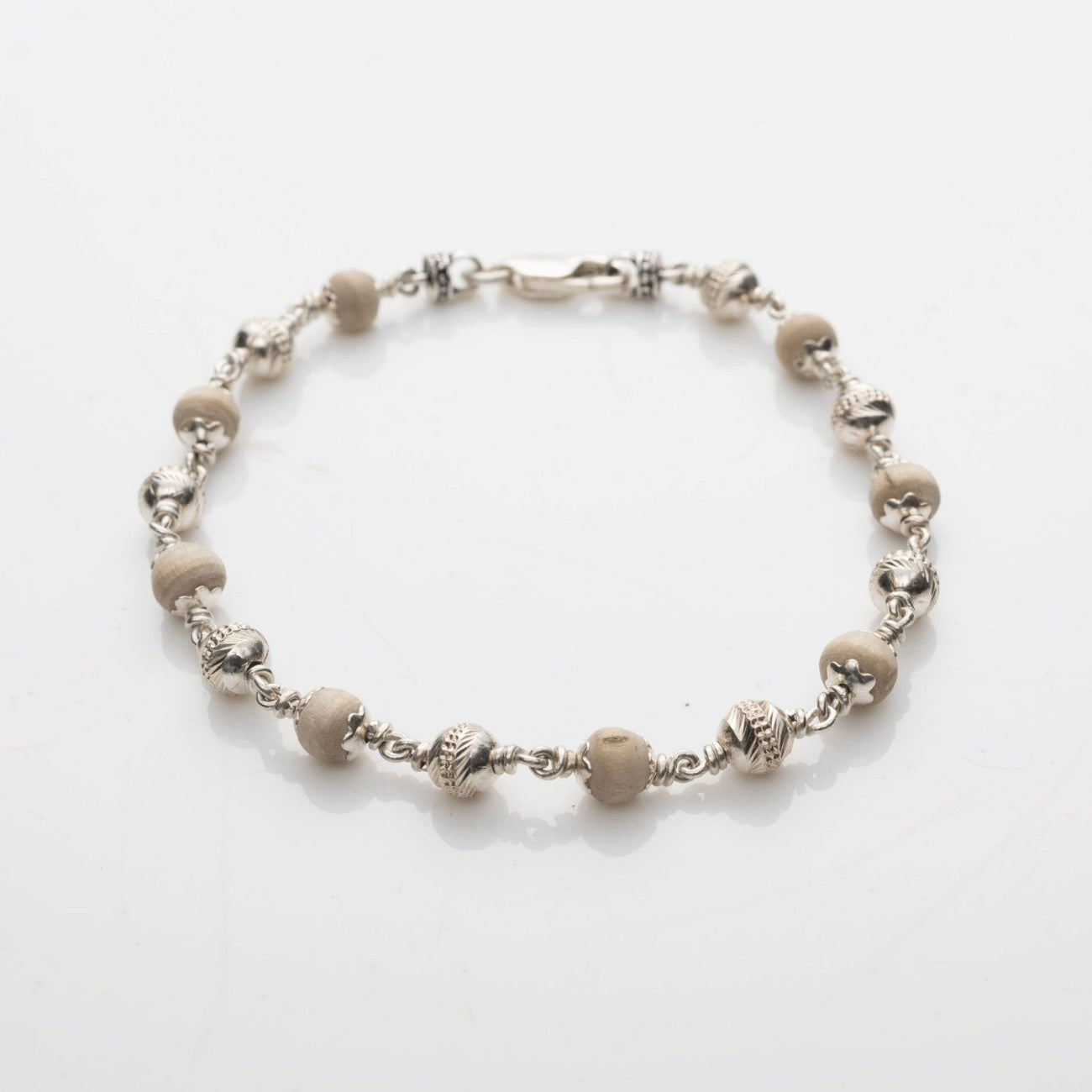 Tulsi With Silver CNC Beads Bracelet