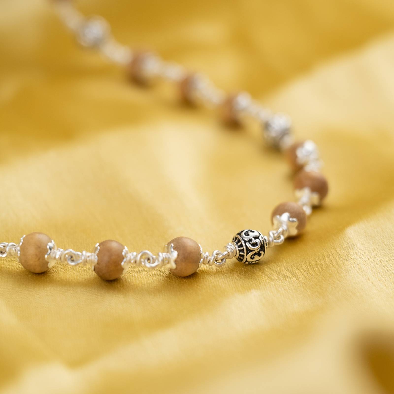 Sandalwood With Om Silver Bead Mala