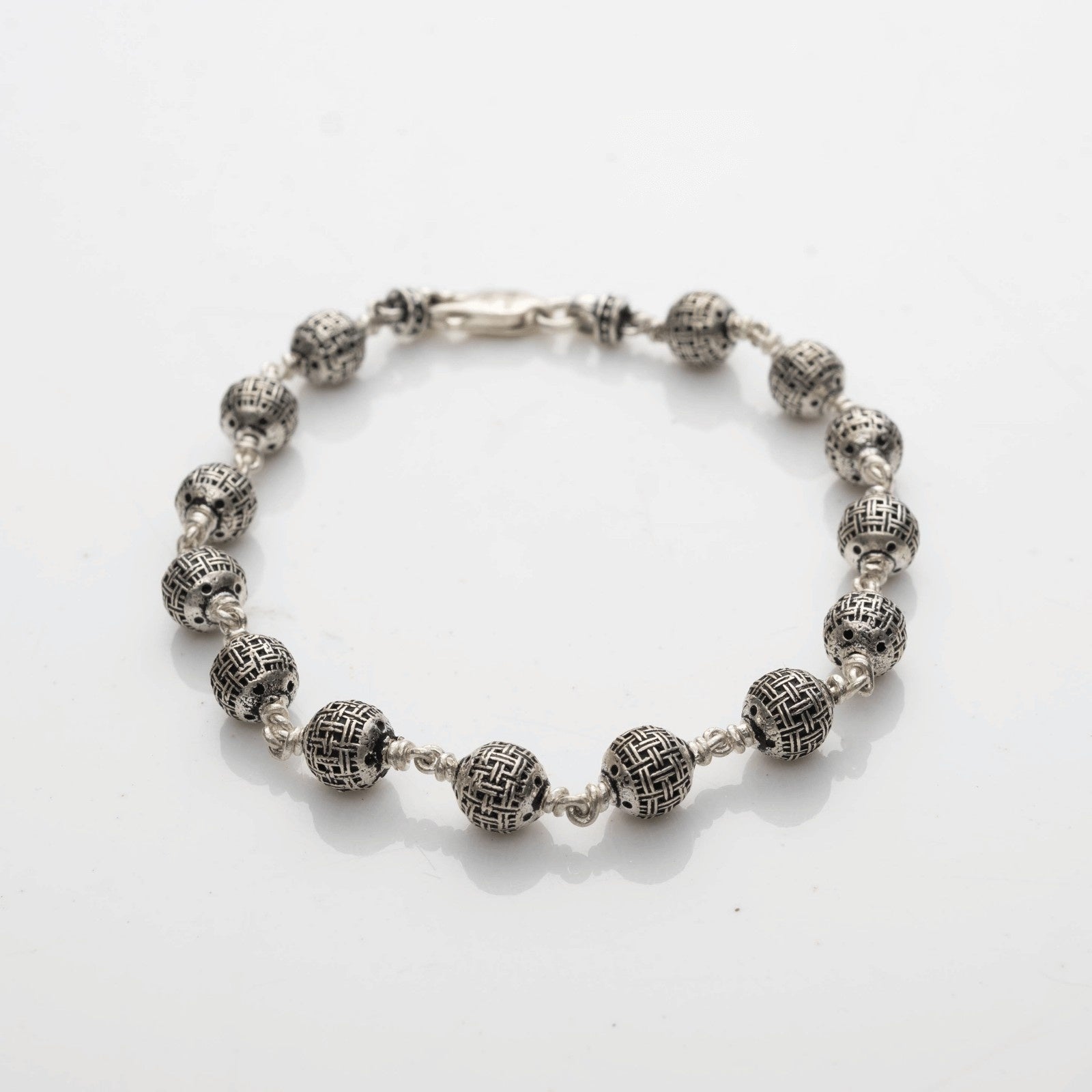 Textured Round Silver Beads Bracelet