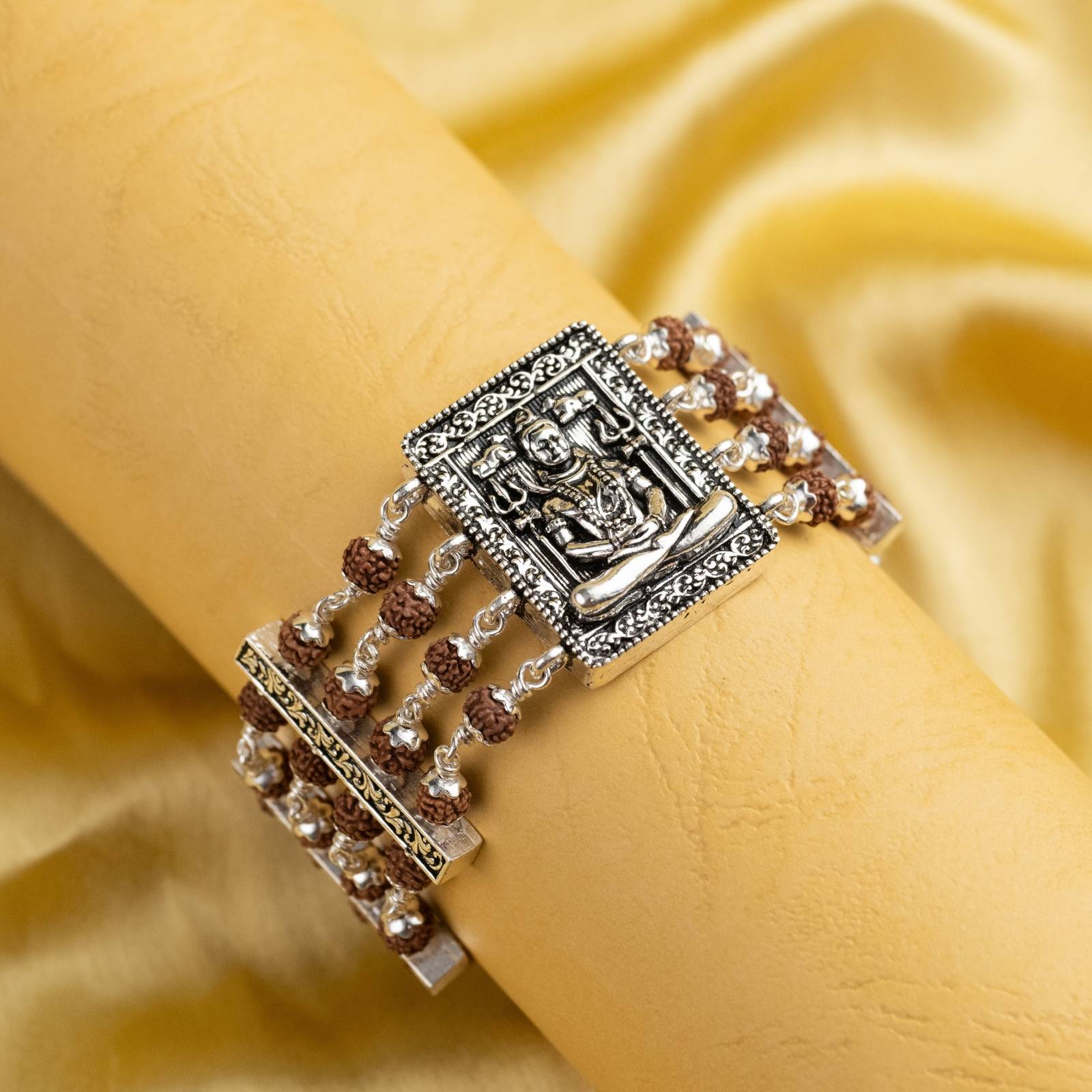 Rudraksha With Silver Shiva Broch Four Line Bracelet