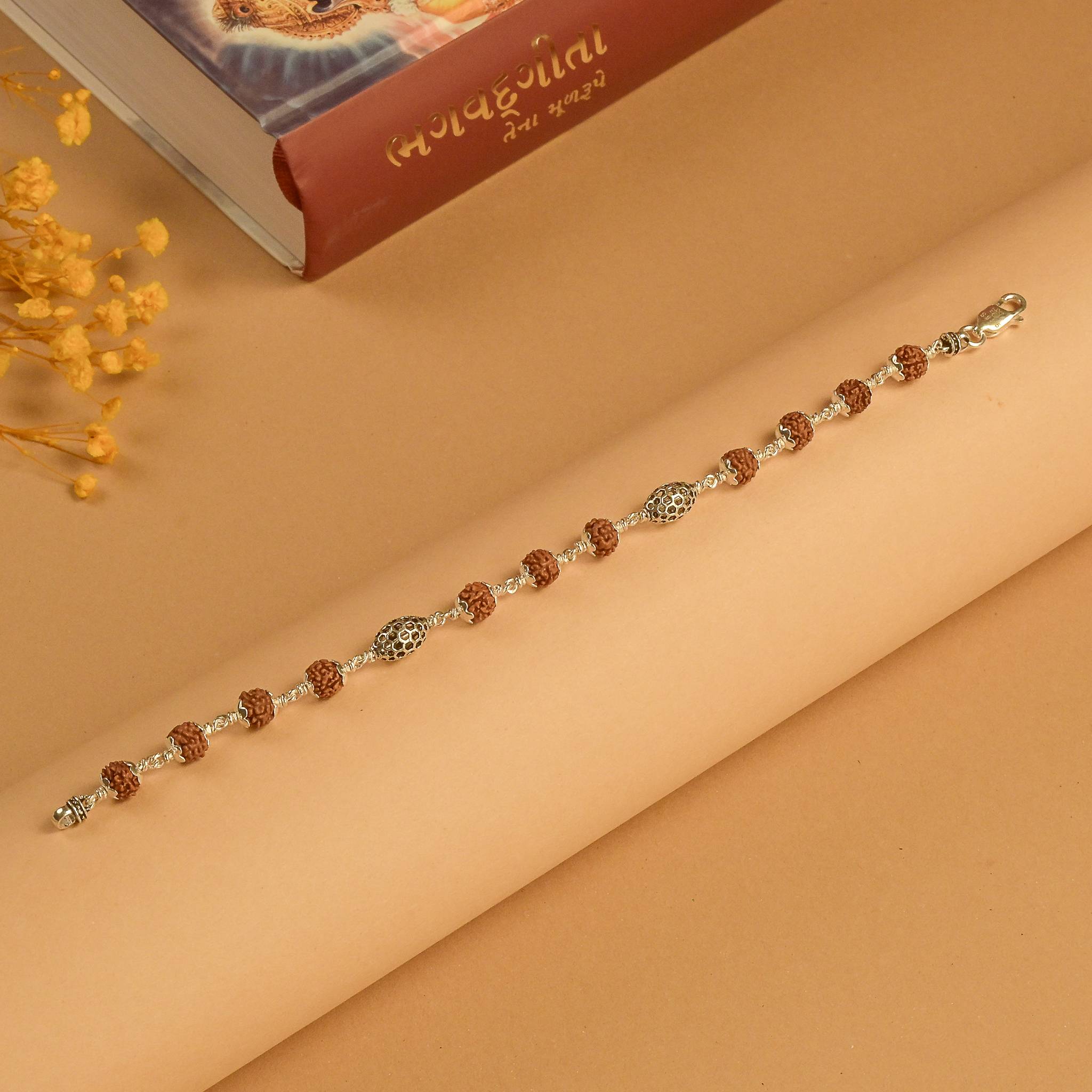 Rudraksha Bracelet with Hollow Oval Silver Beads