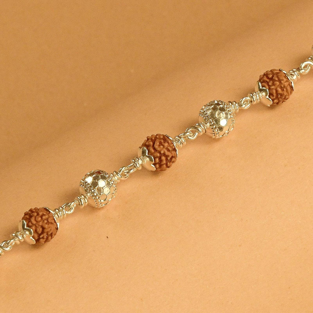 Rudraksha Bracelet with Textured CNC Silver Beads