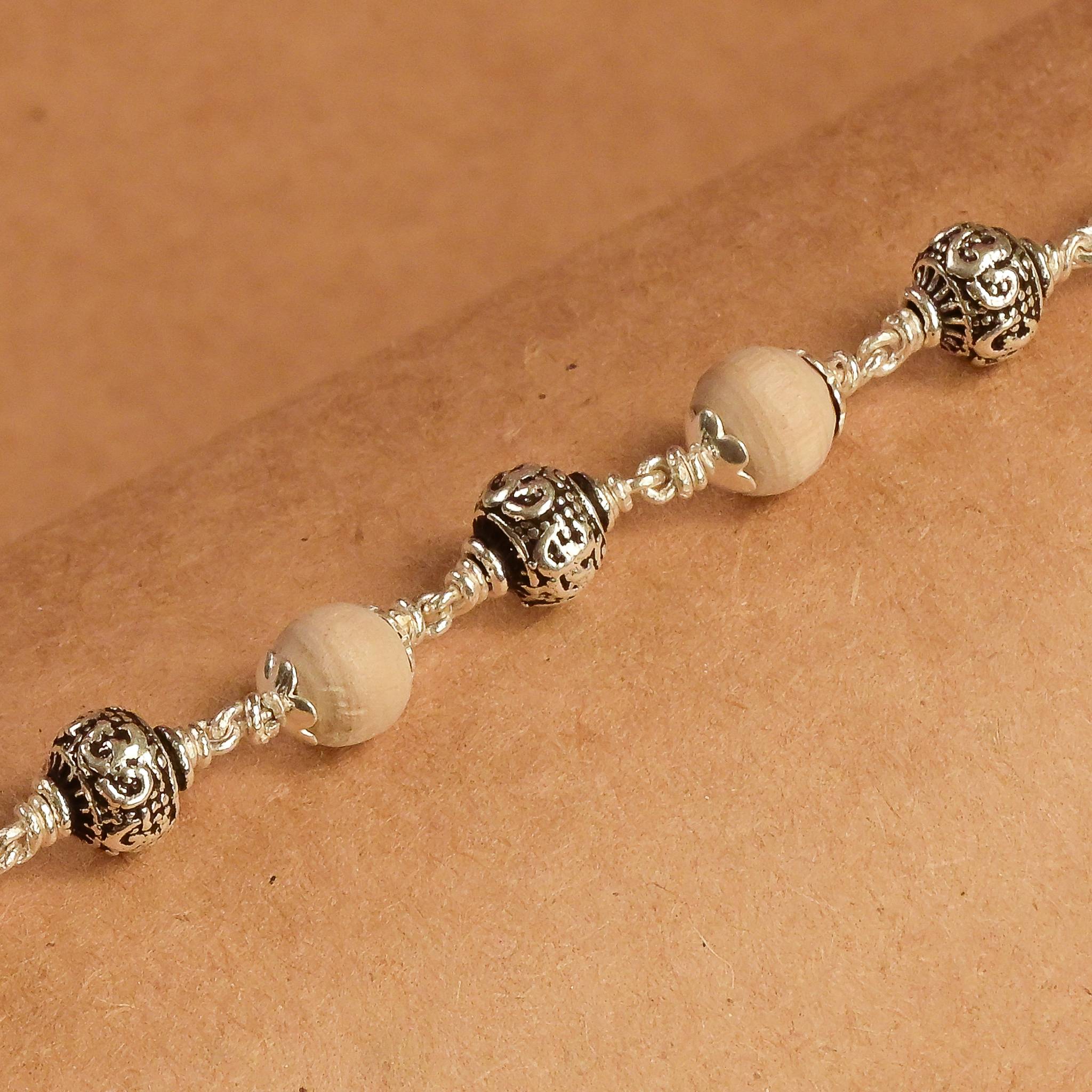 Tulsi Silver Om Beads Bracelet