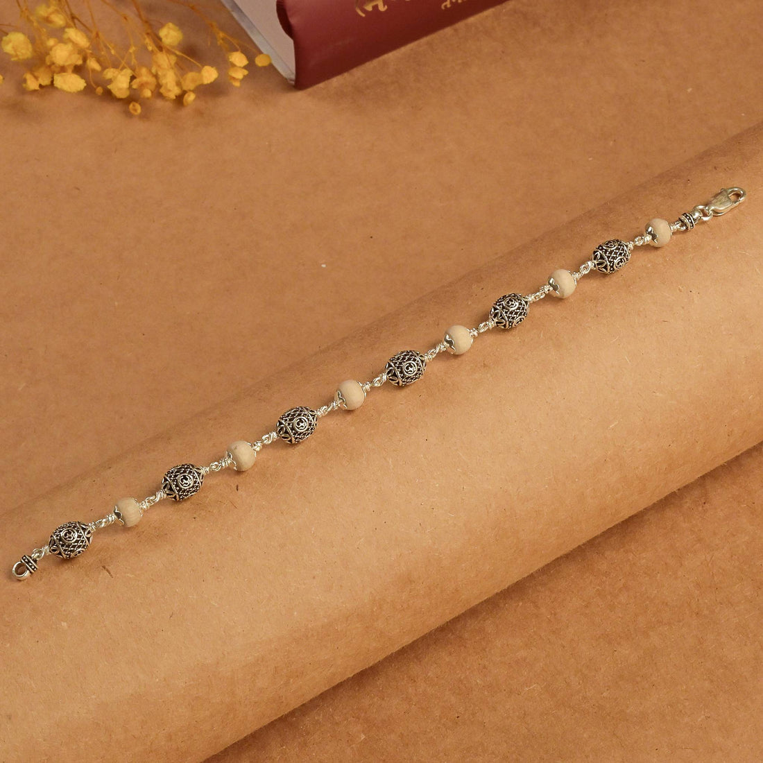 Tulsi With Silver Oval Om Beads Bracelet