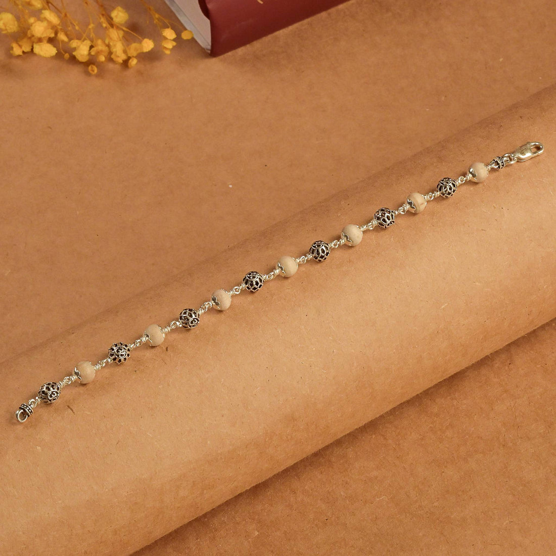 Tulsi with Round Om Beads Silver Bracelet