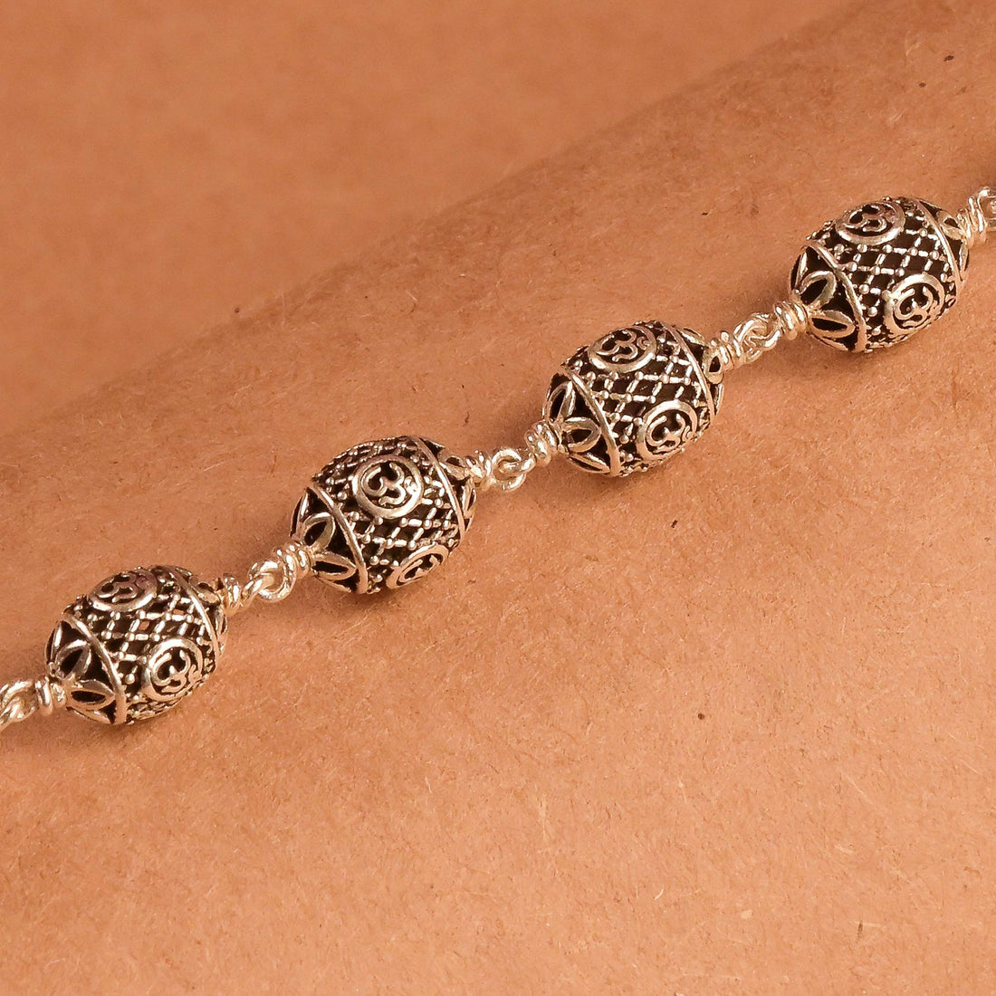 Oval Om Silver Beads Bracelet