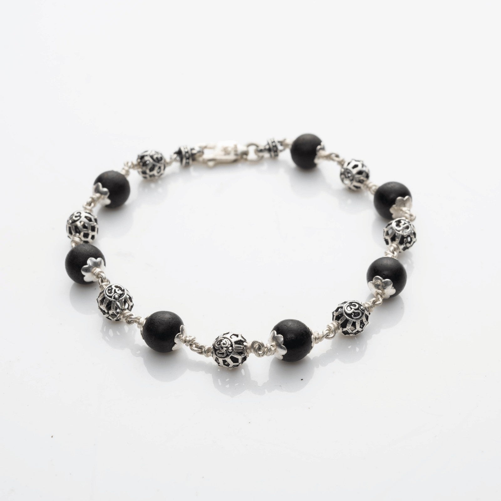 Karungali With Round Om Beads Silver Bracelet