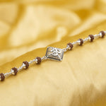 Rudraksha With Om on Rhombus Silver Broach Bracelet