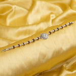 Rudraksha With Om on Round Silver Broach Bracelet